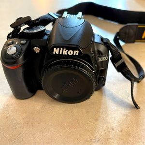 Nikon D3100 with 474 shutter count.